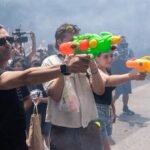 Some Spanish residents, armed with water guns, want tourists to go home
