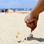France bans smoking in most public areas, enacting stricter anti-smoking laws with costly fines
