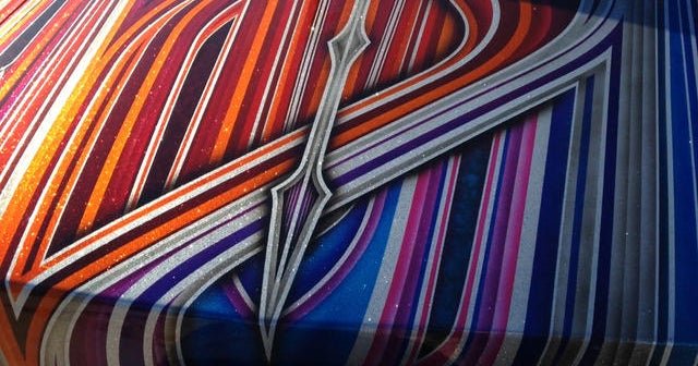 A lowrider artist's journey "out of the darkness"